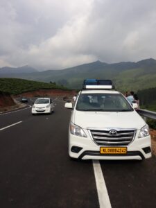 Innova Crysta: A luxurious and reliable taxi for exploring Kerala."